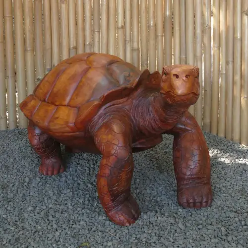 Product image of the product “Turtle, carved from Suar Wood. In the sizes from 80 to 100cm. ”